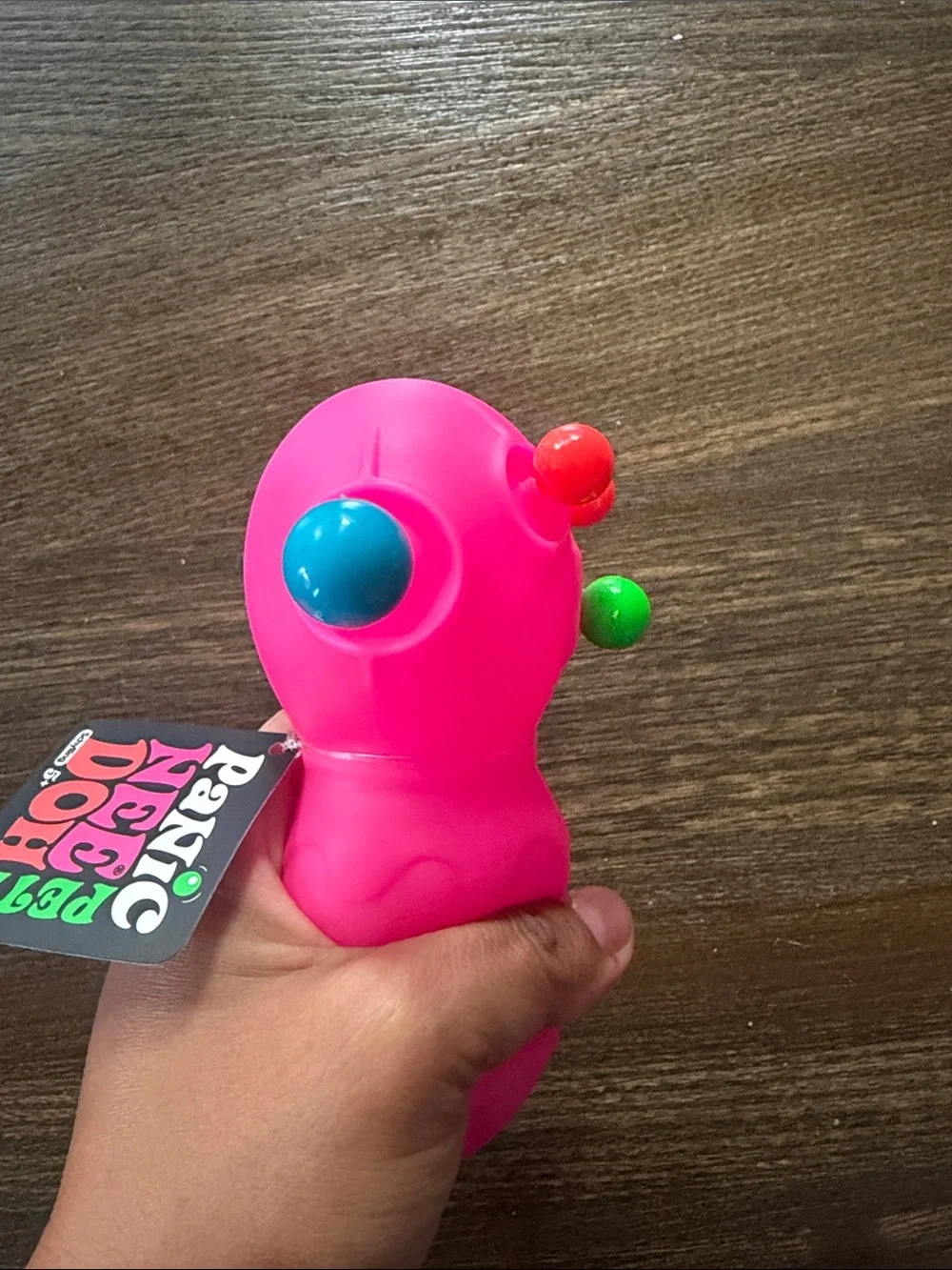 Needoh Panic Pete Bright Pink Sensory Squeeze Toy with Colorful Bumps